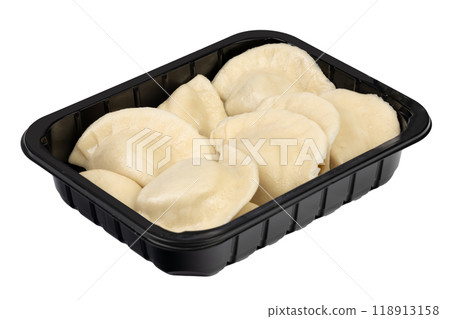Pack of frozen dumplings in plastic tray 118913158