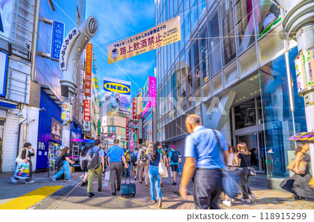 Tokyo cityscape in Japan in October. View of Shibuya Center Street in front of Shibuya Station, bustling with foreigners. Drinking on the street is prohibited on the 2nd. 118915299