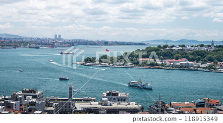 View from the roof of the Bosphorus Strait with ships. Summer panoramic landscape in Istanbul View from the roof of the Bosphorus Strait with ships. Summer panoramic landscape in Istanbul 118915349