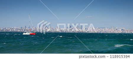 Panoramic view from the sea to Istanbul. The yacht is sailing on the waves in the Sea of Marmara  Panoramic view from the sea to Istanbul. The yacht is sailing on the waves in the Sea of Marmara  118915394