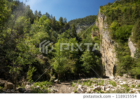 Beautiful landscape of a rocky mountain with a clear blue sky on a summer sunny day. Beautiful landscape of a rocky mountain with a clear blue sky on a summer sunny day. 118915554