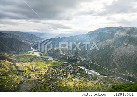 Beautiful landscape with mountains, valley and a river on a sunny summer day with clouds. Dagestan 118915591