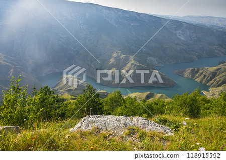 Beautiful landscape with mountains and a river on a sunny summer day with clouds. Sulak Canyon.  118915592