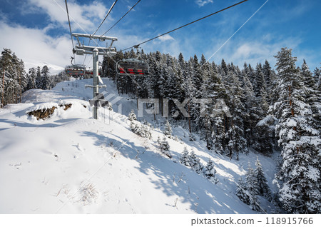 Beautiful landscape of the Arkhyz ski resort with mountains, snow and a cable car Beautiful landscape of the Arkhyz ski resort with mountains, snow and a cable car 118915766