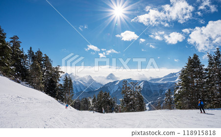 Beautiful landscape of the Arkhyz ski resort with mountains, snow, forest, skiers and snowboarders   118915818