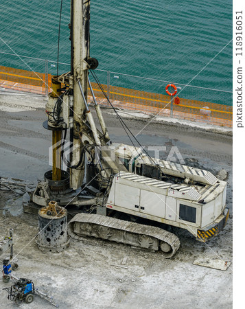 Installation of pile casings in the port quay, drilling rig, port infrastructure upgrade works 118916051
