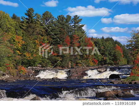 Wilson Falls, with autumn leaf color background in Saint Jerome, Quebec Wilson Falls, with autumn leaf color background in Saint Jerome, Quebec 118916189