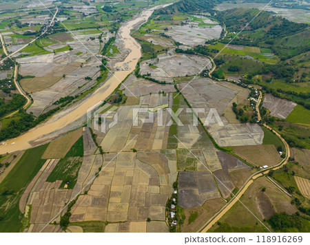 Mountain with farmlands and riverbanks in the Philippines. Mindanao. Mountain with farmlands and riverbanks in the Philippines. Mindanao. 118916269