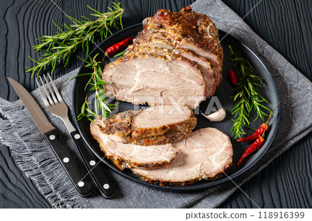 Roast Pork Neck sliced on a plate, top view Roast Pork Neck sliced on a plate, top view 118916399