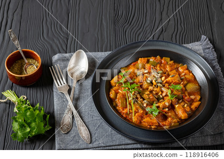 healthy zucchini stew in tomato sauce, top view healthy zucchini stew in tomato sauce, top view 118916406