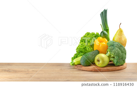 Fresh vegetables, fruits, food on wooden plate on table isolated on white. food delivery concept. copy space 118916430