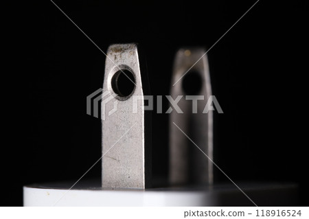 Type A plug close up, dark background, plug and socket used in USA, Canada, Japan, Mexico Type A plug close up, dark background, plug and socket used in USA, Canada, Japan, Mexico 118916524