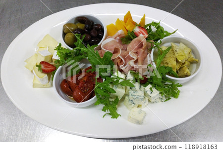 appetizer with wine:black olives, elite varieties of cheese, jamon, prosciutto 118918163