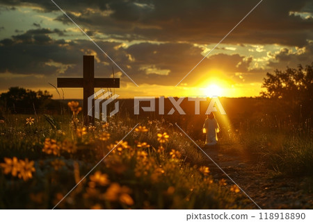 A wooden cross is standing in a field of yellow flowers 118918890