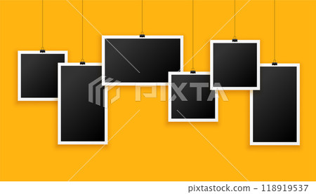 different shapes photo frames on yellow background 118919537