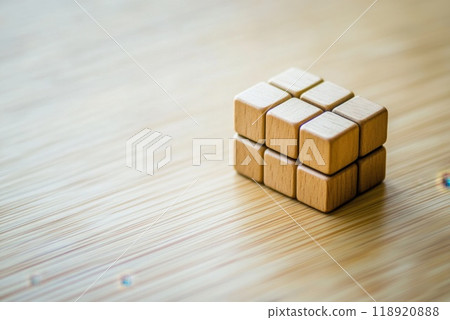 A set of wooden blocks stacked creatively on a smooth surface in a cozy indoor setting A set of wooden blocks stacked creatively on a smooth surface in a cozy indoor setting 118920888