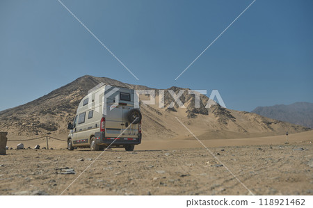 Camper in archaeological site of Caral, near Supe, Barranca Province, Peru. Caral is a UNESCO world heritage site and considered to be the oldest city in the Americas. 118921462