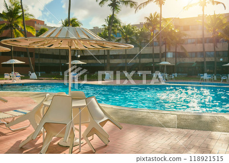 Swimming pools on tropical beach in Caribbean hotel 118921515