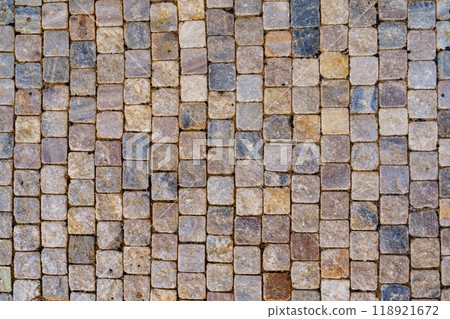 Beautiful and intricate cobblestone street pavement mosaic pattern texture for urban design 118921672