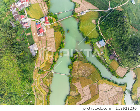 Aerial wide angle view of landscape with rice field at Phong Nam village in Trung Khanh, Cao Bang province,Northern Vietnam Aerial wide angle view of landscape with rice field at Phong Nam village in Trung Khanh, Cao Bang province,Northern Vietnam 118922236