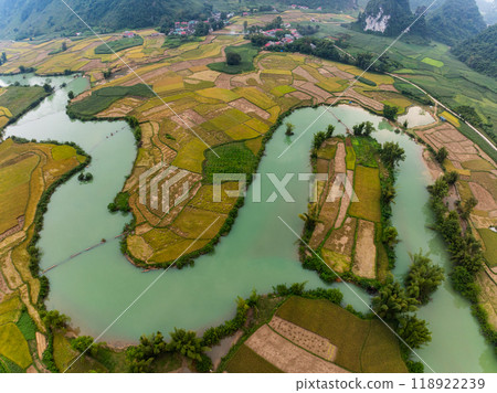 Aerial wide angle view of landscape with rice field at Phong Nam village in Trung Khanh, Cao Bang province,Northern Vietnam Aerial wide angle view of landscape with rice field at Phong Nam village in Trung Khanh, Cao Bang province,Northern Vietnam 118922239