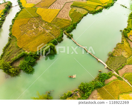 Aerial wide angle view of landscape with rice field at Phong Nam village in Trung Khanh, Cao Bang province,Northern Vietnam Aerial wide angle view of landscape with rice field at Phong Nam village in Trung Khanh, Cao Bang province,Northern Vietnam 118922269