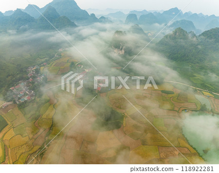Aerial wide angle view of landscape with rice field at Phong Nam village in Trung Khanh, Cao Bang province,Northern Vietnam Aerial wide angle view of landscape with rice field at Phong Nam village in Trung Khanh, Cao Bang province,Northern Vietnam 118922281