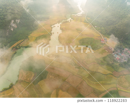 Aerial wide angle view of landscape with rice field at Phong Nam village in Trung Khanh, Cao Bang province,Northern Vietnam Aerial wide angle view of landscape with rice field at Phong Nam village in Trung Khanh, Cao Bang province,Northern Vietnam 118922283