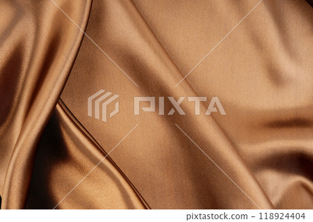 Golden brown satin texture background. 118924404