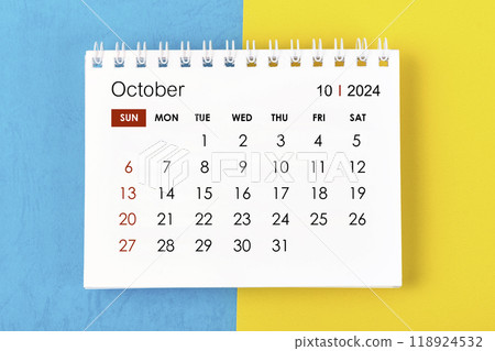 October 2024 Monthly desk calendar for 2024 year on blue and yellow. October 2024 Monthly desk calendar for 2024 year on blue and yellow. 118924532