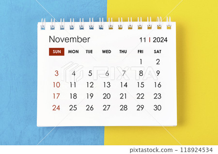 November 2024 Monthly desk calendar for 2024 year on blue and yellow. 118924534