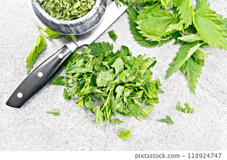 Nettle fresh cut on gray stone top 118924747
