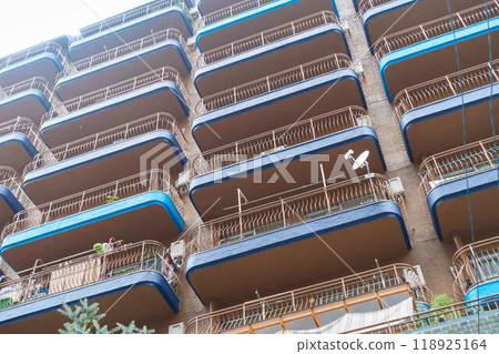 An apartment building with colorful balconies An apartment building with colorful balconies 118925164