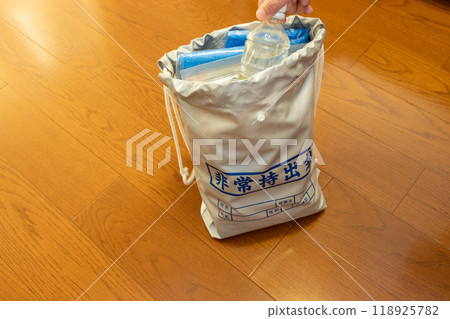 Put a plastic bottle of drinking water in your disaster preparedness bag Put a plastic bottle of drinking water in your disaster preparedness bag 118925782