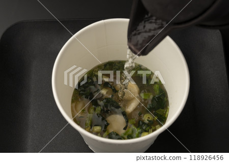Instant miso soup Pour hot water into a miso soup cup Instant miso soup Pour hot water into a miso soup cup 118926456