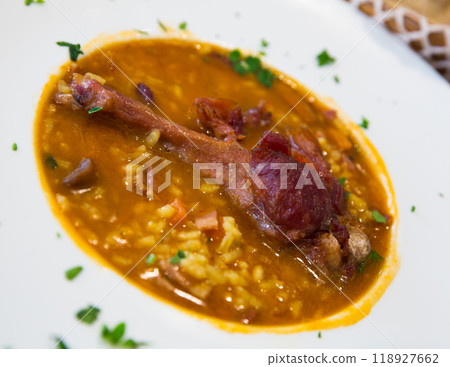 Stewed duck with rice and mushrooms 118927662