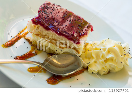 Piece of blueberry cake 118927701