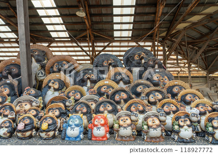 A shop front in Shigaraki Town, Koka City, Shiga Prefecture, selling ceramic tanuki figurines 118927772