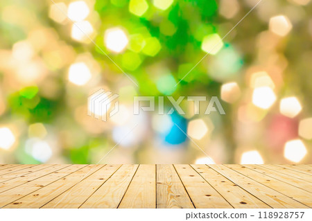 Empty wood table top with blur Christmas tree with bokeh light background 118928757