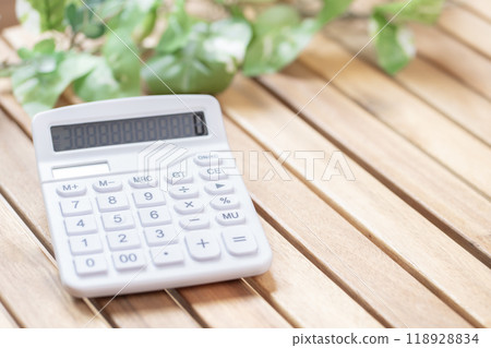 Calculator on the table 118928834