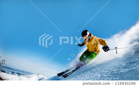 Skier gliding down the slope 118930206