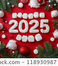 Winter christmas decors on red background and and the number 2025 is made of marshmallows, top view, post card for candy shop for New year 118930987
