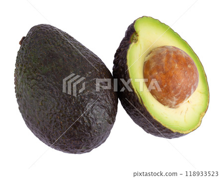 Avocado and Half of fresh avocado with kernel isolated on a white background. 118933523