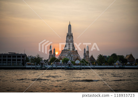Pagoda at Wat Arun, a royal temple at Chaopraya river on sunset time, Bangkok, Thailand. 118933723