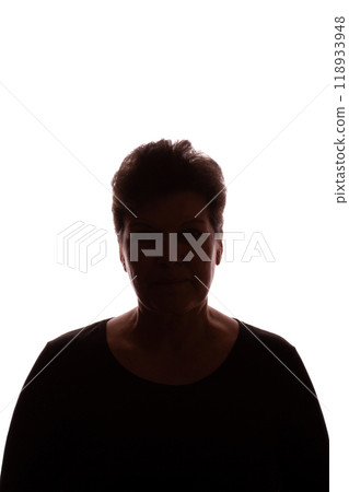 Dark silhouette of an elderly woman, pensioner, curly hair - isolate 118933948