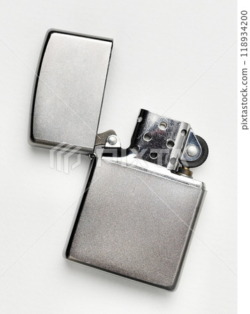 Windproof Oil lighter on the isolated white background, popular and fashionable vintage look lighter Windproof Oil lighter on the isolated white background, popular and fashionable vintage look lighter 118934200