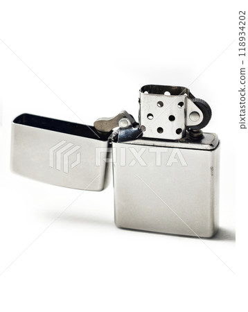 Windproof Oil lighter on the isolated white background, popular and  fashionable vintage look lighter 118934202