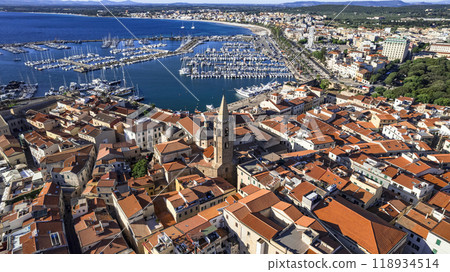 Sardegna (Sardinia) island landmarks. Charming historic Alghero. Aerial drone panoramic view of marine and old town Sardegna (Sardinia) island landmarks. Charming historic Alghero. Aerial drone panoramic view of marine and old town 118934514