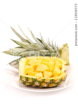 Pineapple basket cut fruit bright background 118936573