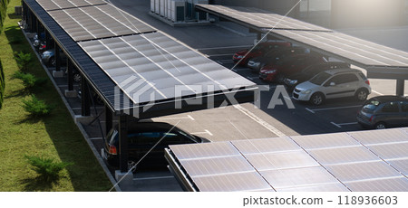 Parking space with solar panels on a roof 118936603